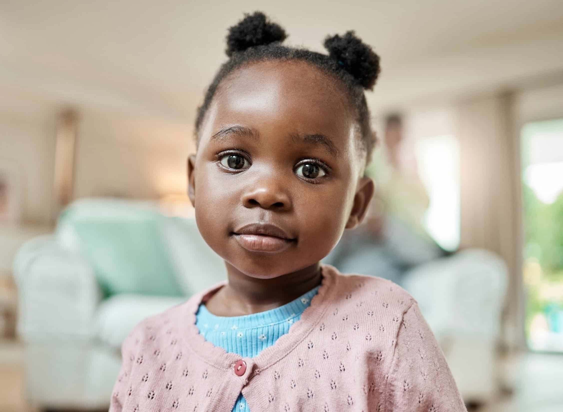 3 year old girl in a pink sweater
